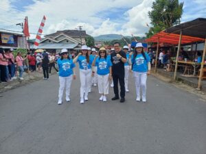 Desa Kolongan Atas Satu Kecamatan Sonder Tampil Kompak di Pawai Pembangunan HUT RI ke-80